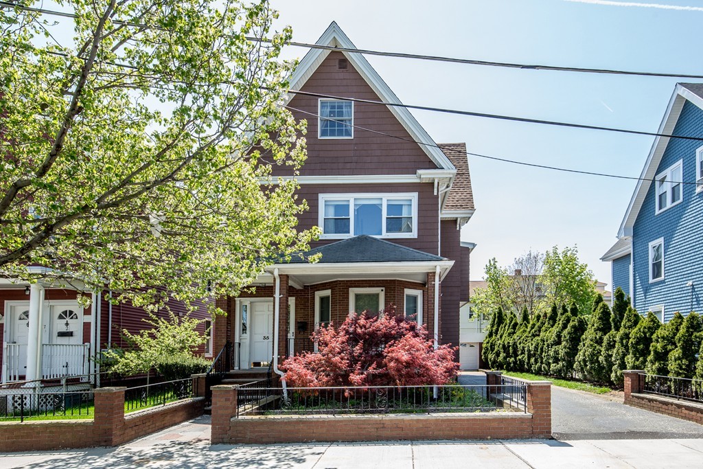 35 Winthrop Street Everett, MA 02149 - Photo 2 of 30 a front view of a house with garden