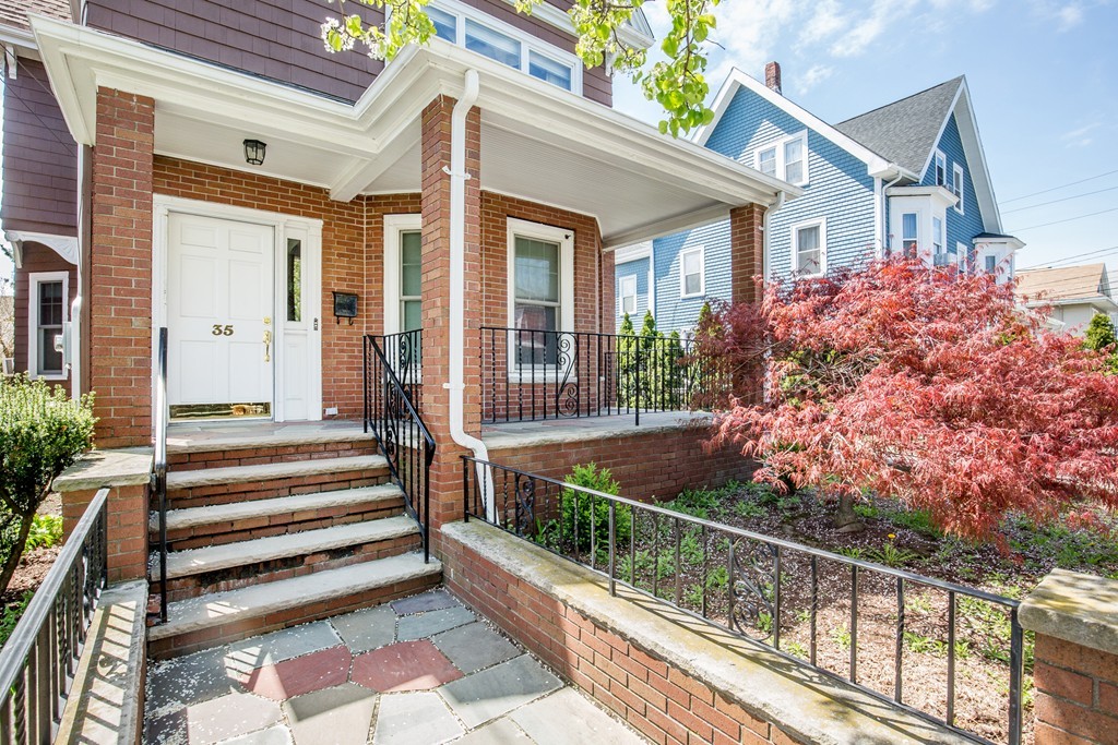 35 Winthrop Street Everett, MA 02149 - Photo 3 of 30 a front view of a house with a porch