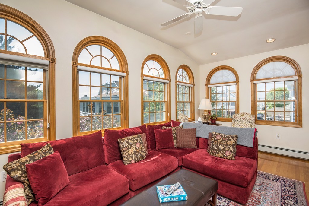35 Winthrop Street Everett, MA 02149 - Photo 5 of 30 a living room with furniture fireplace and a large window