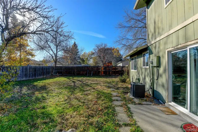 a view of backyard with green space