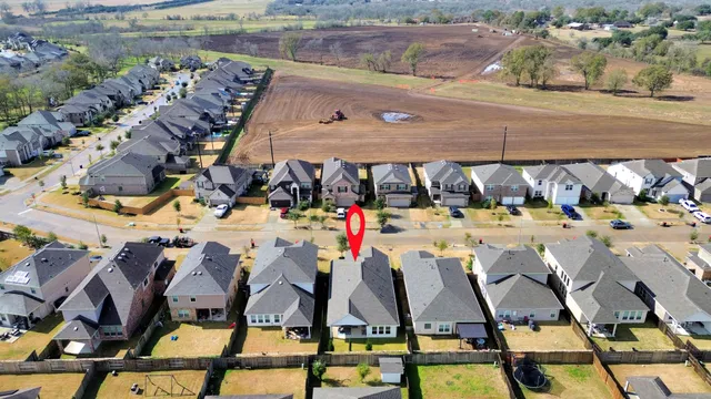 an aerial view of a building with outdoor space