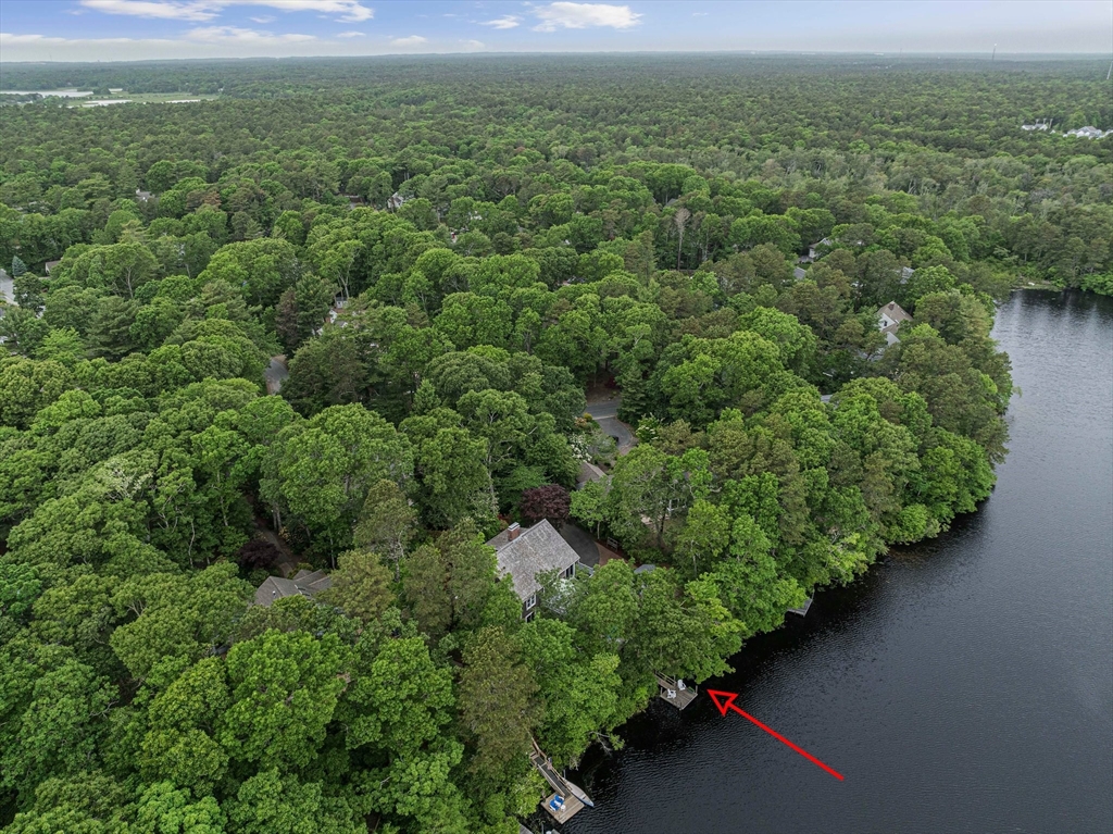 74 Fells Pond Road Mashpee, MA 02649 - Photo 34 of 36 an aerial view of a houses with a yard
