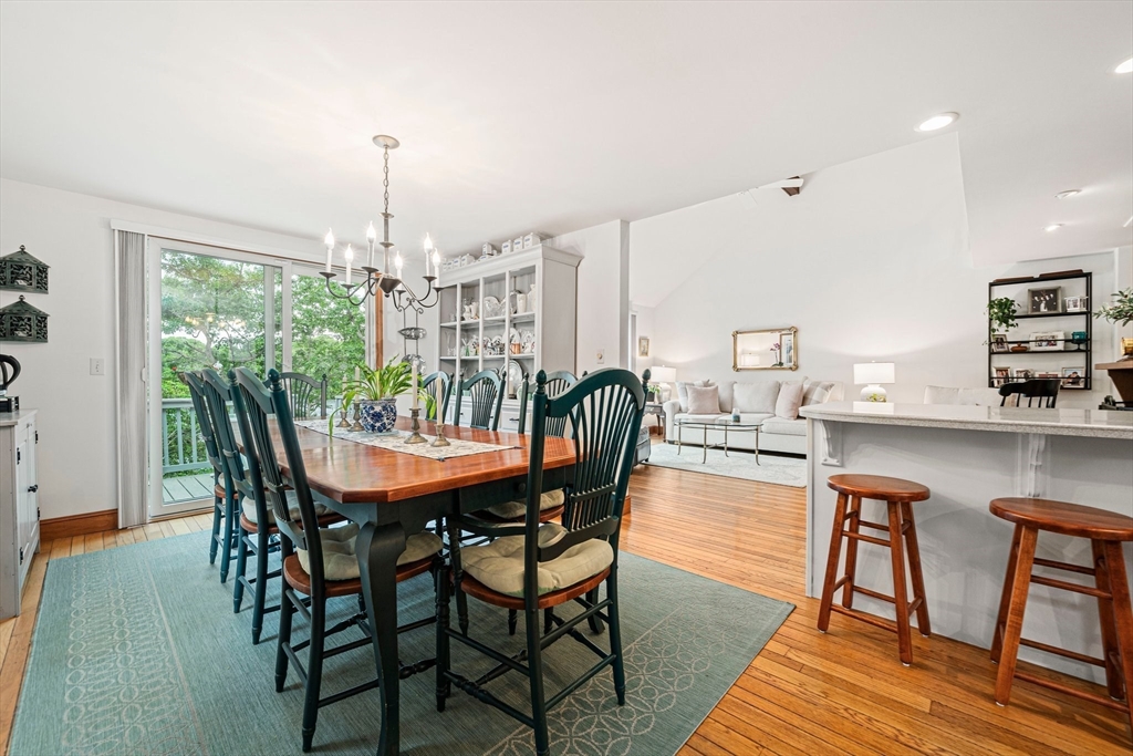 74 Fells Pond Road Mashpee, MA 02649 - Photo 7 of 36 a dining room with furniture and wooden floor