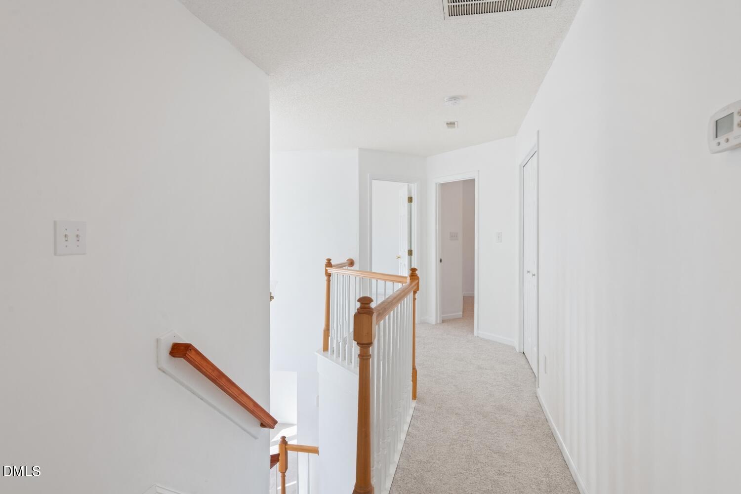 5273 Fairmead Circle Raleigh, NC 27613 - Photo 15 of 36 Upstairs Hallway