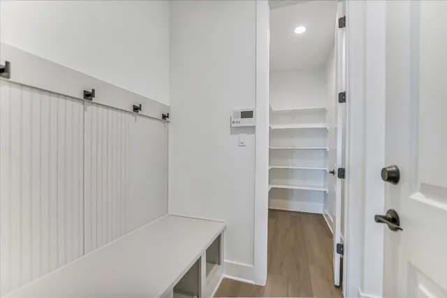 a view of a hallway with closet