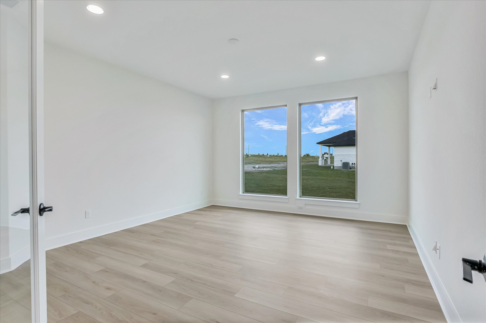 220 Scofield Avenue Georgetown, TX 78626 - Photo 17 of 32 a view of an empty room with a window