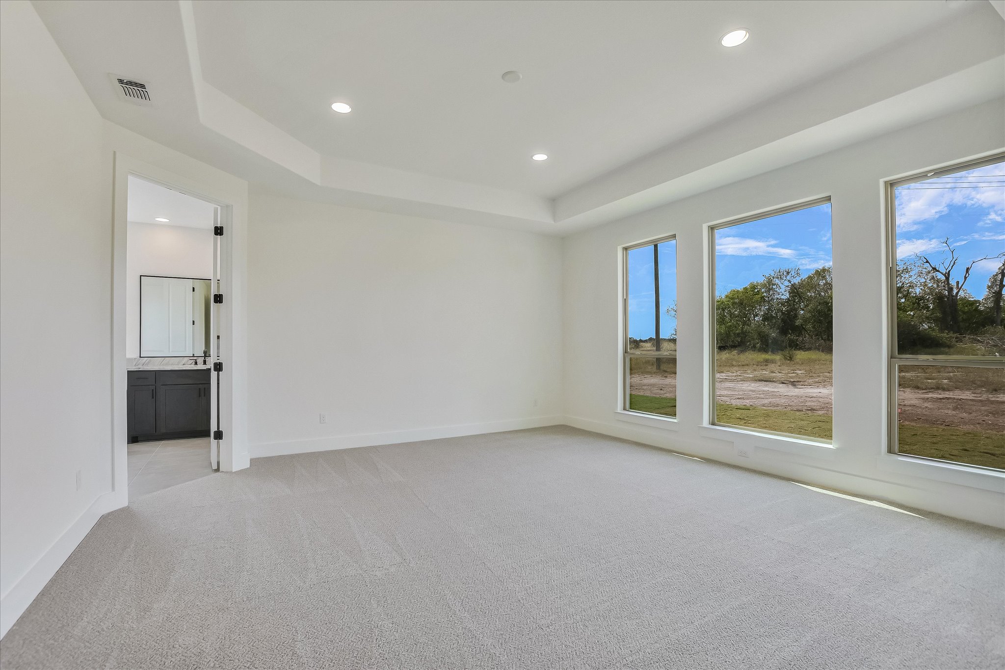 220 Scofield Avenue Georgetown, TX 78626 - Photo 18 of 32 a view of an empty room with a window
