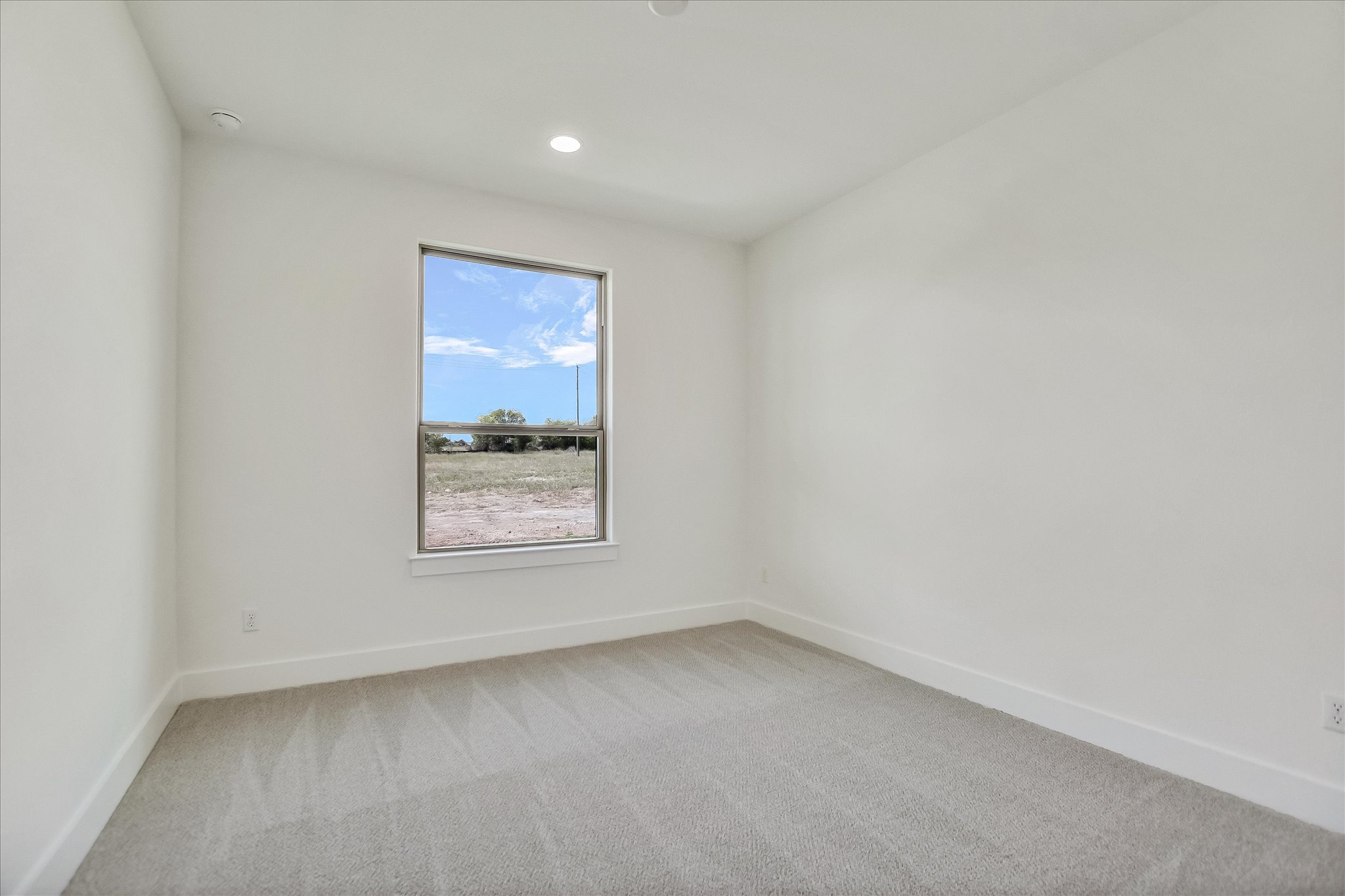 220 Scofield Avenue Georgetown, TX 78626 - Photo 23 of 32 a view of an empty room with a window