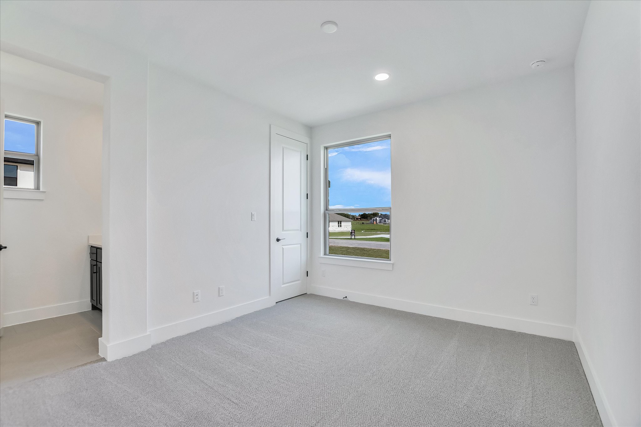 220 Scofield Avenue Georgetown, TX 78626 - Photo 25 of 32 a view of an empty room and a window