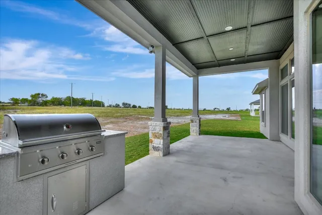 a view of a garden with an outdoor space