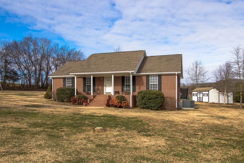 125 Crescent View Cutoff Road Pulaski, TN 38478 - Photo 1 of 30 a front view of a house with a yard
