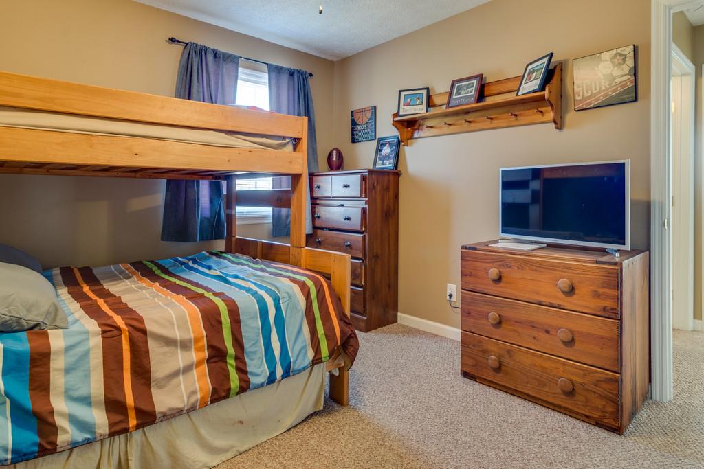 125 Crescent View Cutoff Road Pulaski, TN 38478 - Photo 22 of 30 a bedroom with a bed and furniture