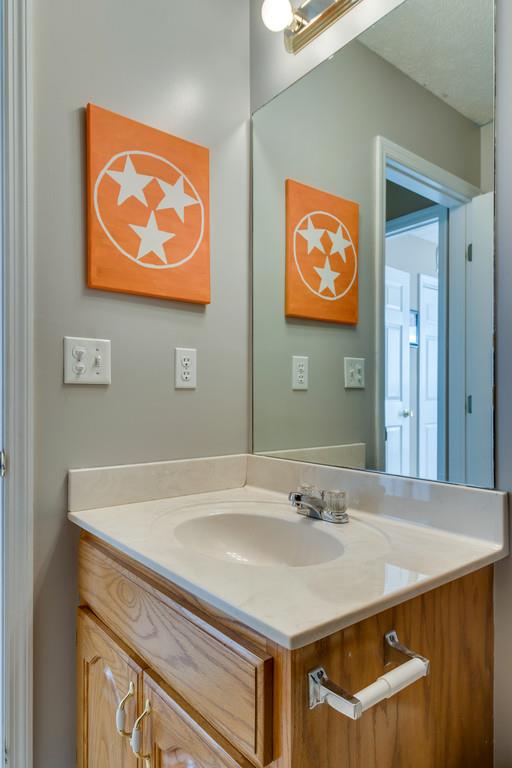 125 Crescent View Cutoff Road Pulaski, TN 38478 - Photo 24 of 30 a bathroom with a sink and a mirror