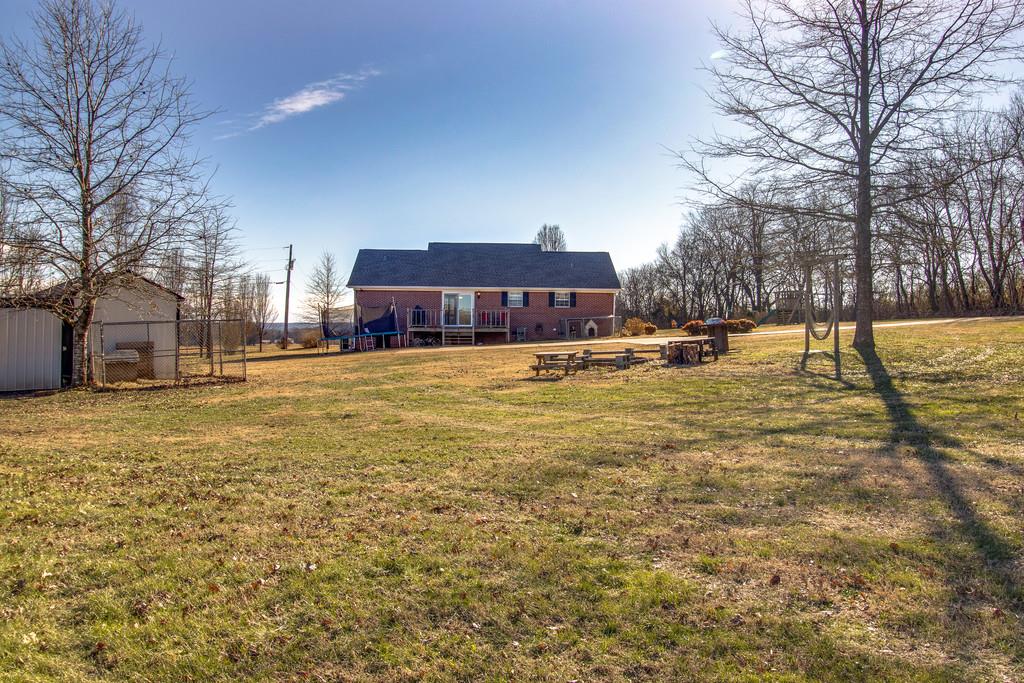 125 Crescent View Cutoff Road Pulaski, TN 38478 - Photo 30 of 30 a view of a large pool with a yard