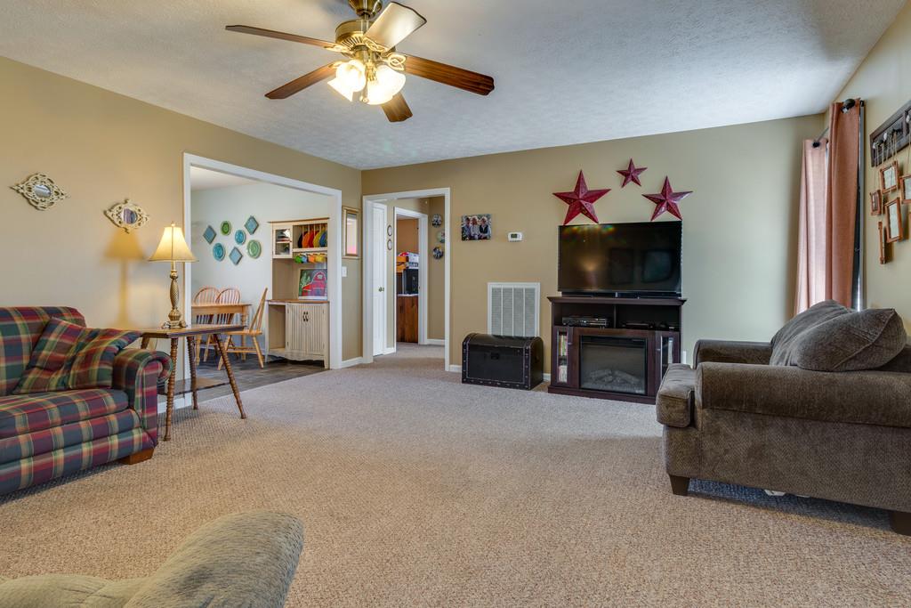 125 Crescent View Cutoff Road Pulaski, TN 38478 - Photo 5 of 30 a living room with furniture and a flat screen tv