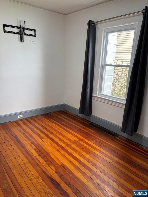 35 Charles Street, Unit 1 Little Ferry, NJ 07643 - Photo 14 of 21 a view of a room with a wooden floor and a window
