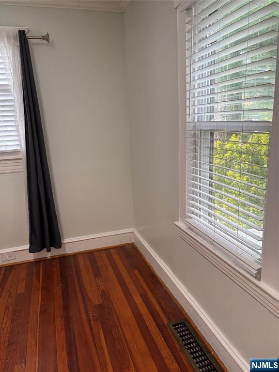 35 Charles Street, Unit 1 Little Ferry, NJ 07643 - Photo 19 of 21 a view of a room with wooden floor and windows