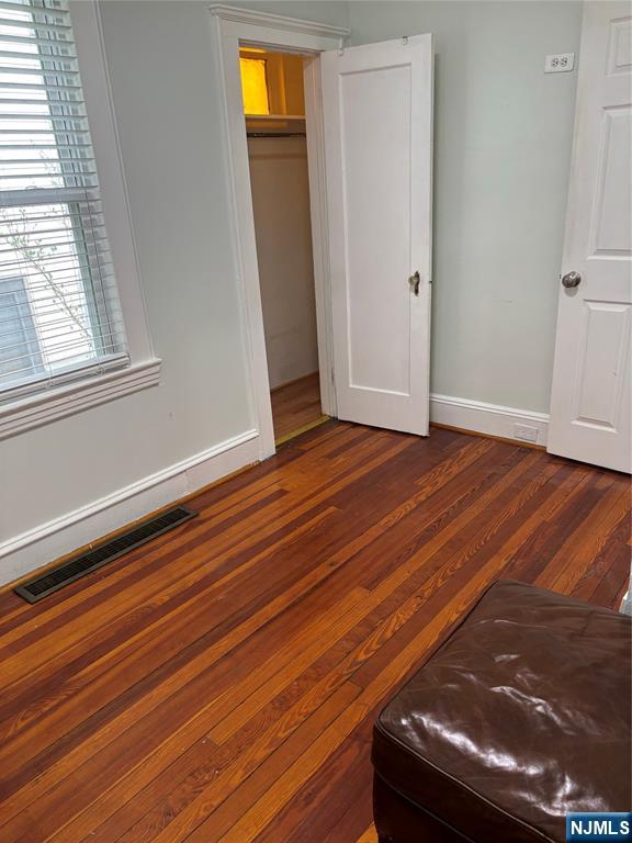 35 Charles Street, Unit 1 Little Ferry, NJ 07643 - Photo 20 of 21 a view of room with window and wooden floor