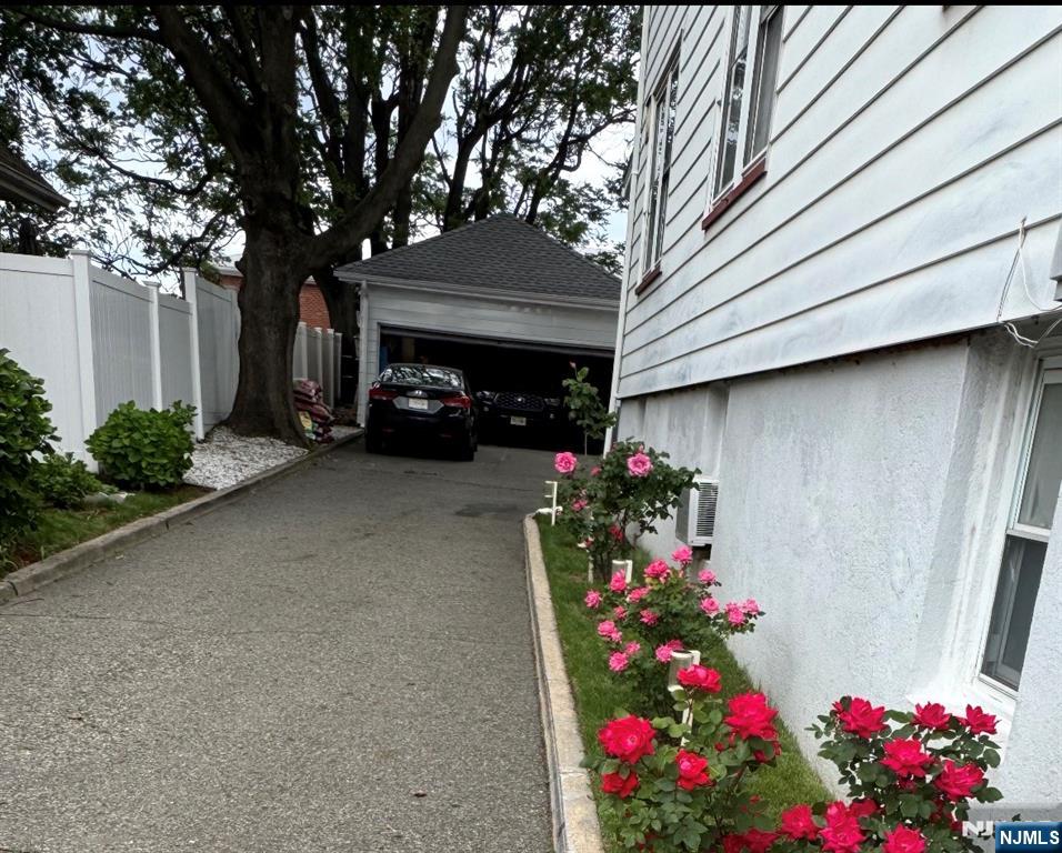 35 Charles Street, Unit 1 Little Ferry, NJ 07643 - Photo 2 of 21 a view of a outdoor space with a lot of flowers
