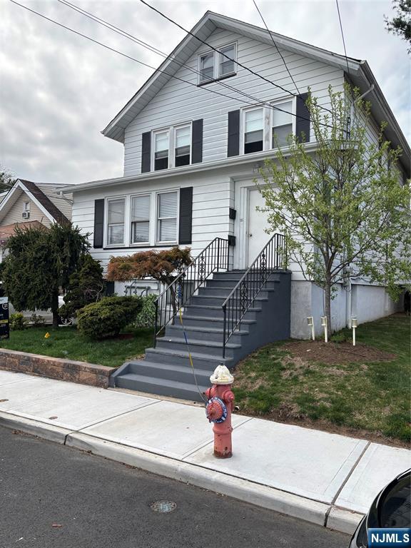 35 Charles Street, Unit 1 Little Ferry, NJ 07643 - Photo 21 of 21 a front view of a house with garden