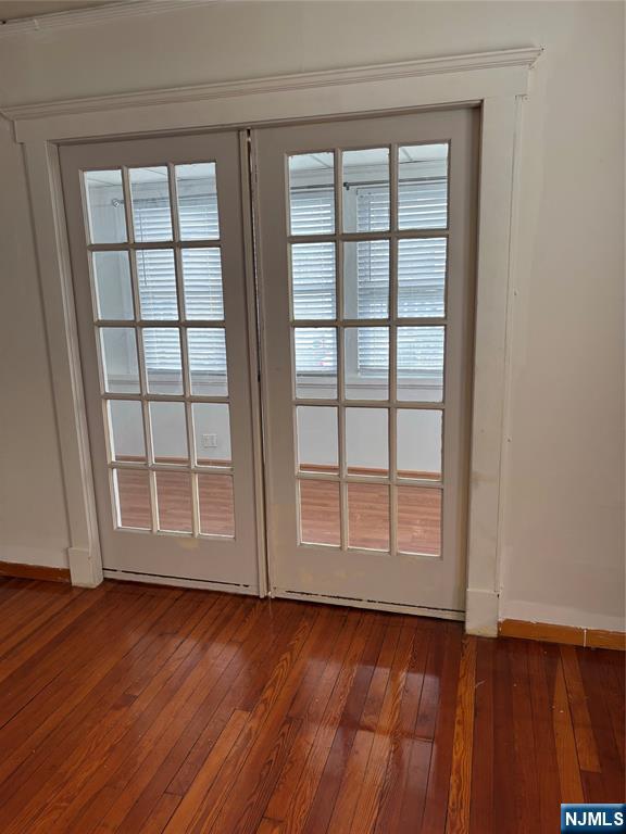 35 Charles Street, Unit 1 Little Ferry, NJ 07643 - Photo 6 of 21 an empty room with wooden floor and windows