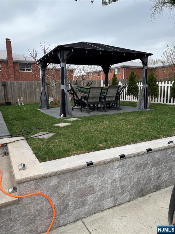 35 Charles Street, Unit 1 Little Ferry, NJ 07643 - Photo 7 of 21 front view of a house with a yard