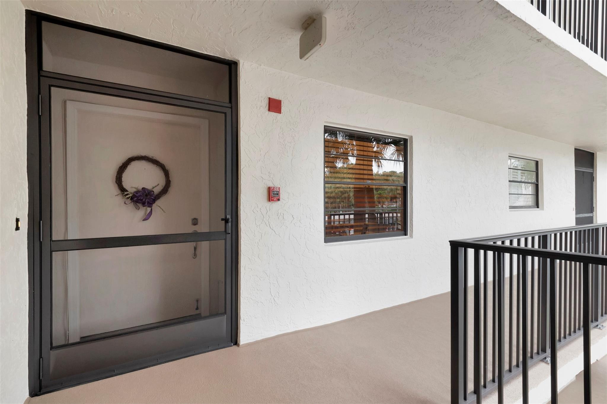 9170 Southwest 14th Street, Unit 4201 Boca Raton, FL 33428 - Photo 22 of 30 Extra Wide Brand New Front Screen Door.