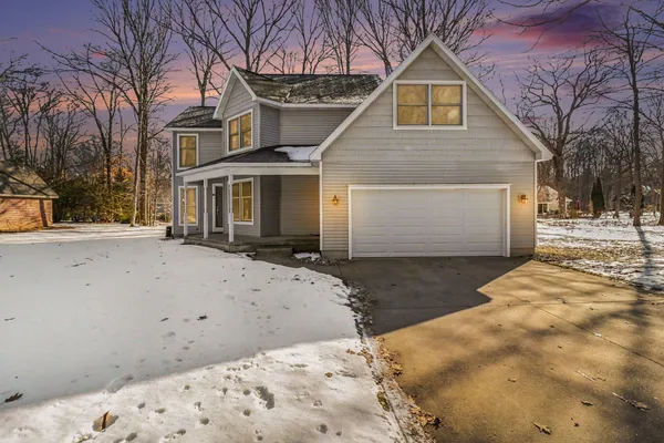 $460,000 | 1854 Tall Oaks Drive West, Ludington, MI 49431