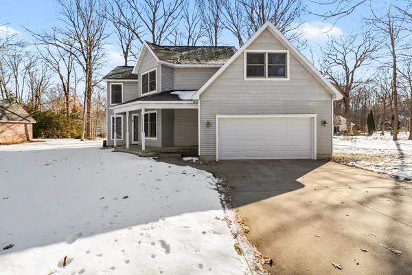 $460,000 | 1854 Tall Oaks Drive West, Ludington, MI 49431