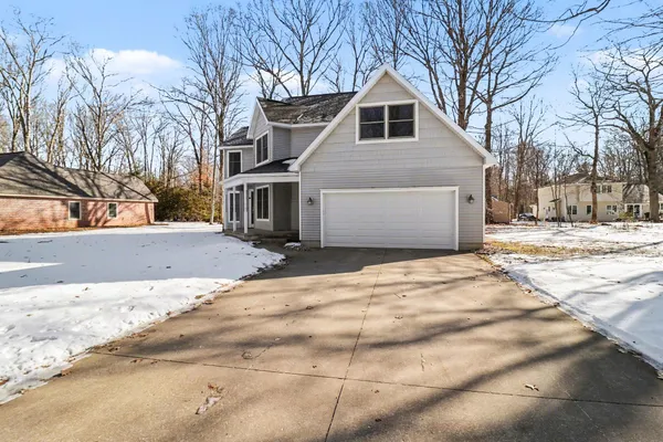 $460,000 | 1854 Tall Oaks Drive West, Ludington, MI 49431
