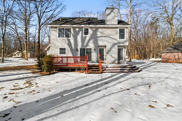 $460,000 | 1854 Tall Oaks Drive West, Ludington, MI 49431