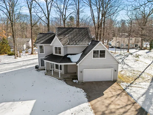 $460,000 | 1854 Tall Oaks Drive West, Ludington, MI 49431