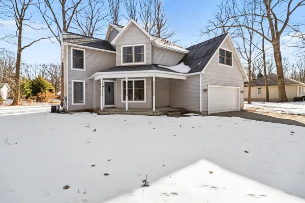 $460,000 | 1854 Tall Oaks Drive West, Ludington, MI 49431
