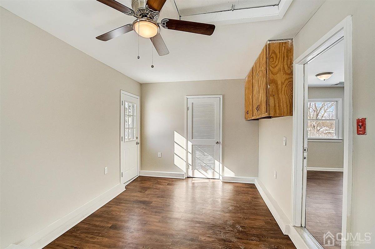 17 Cambridge Road Kendall Park, NJ 08824 - Photo 21 of 28 a view of a hallway with wooden floor