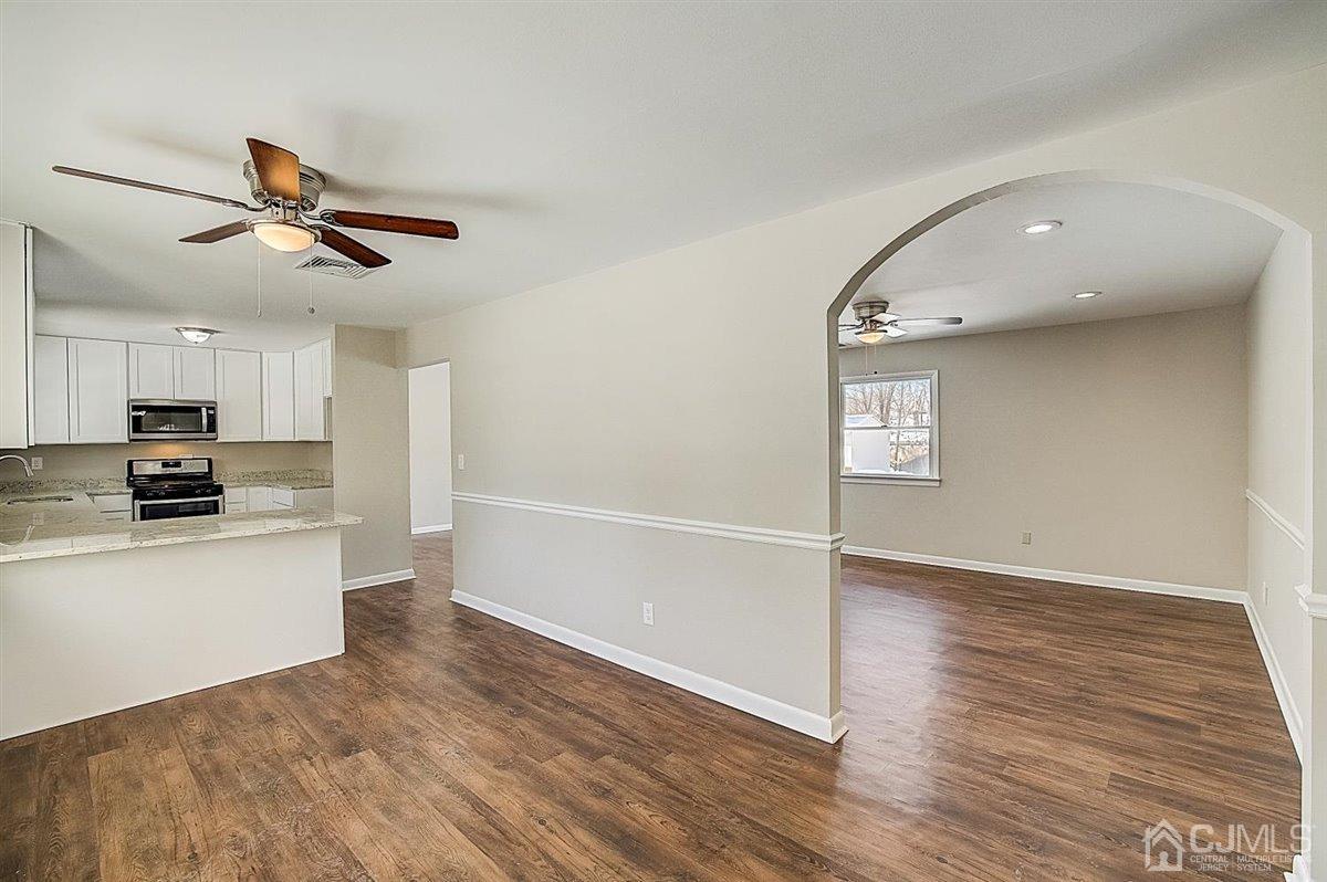 17 Cambridge Road Kendall Park, NJ 08824 - Photo 8 of 28 a view of kitchen with sink microwave and stove