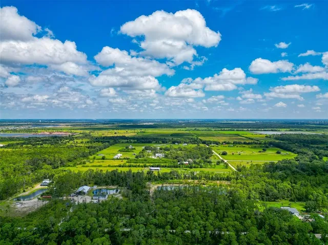 a view of a lake with a big yard