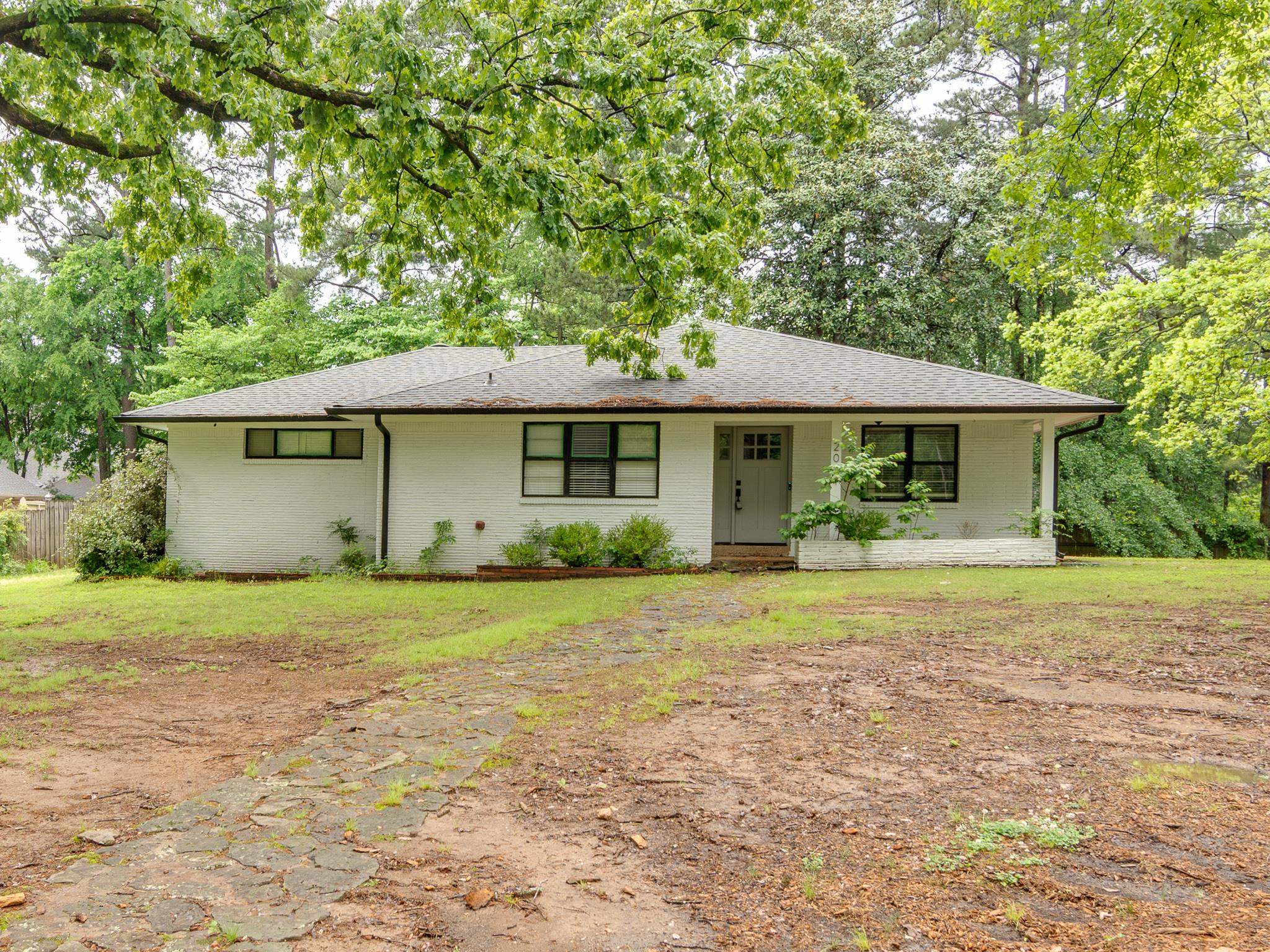 2021 Sunset Road Germantown, TN 38138 - Photo 1 of 26 Ranch-style home featuring a porch, a shingled roof, and brick siding
