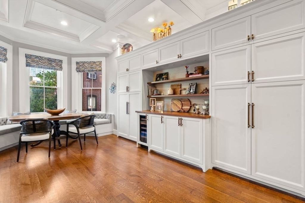 288 Commonwealth Avenue, Unit 3 Boston, MA 02115 - Photo 13 of 25 a workspace with wooden floor