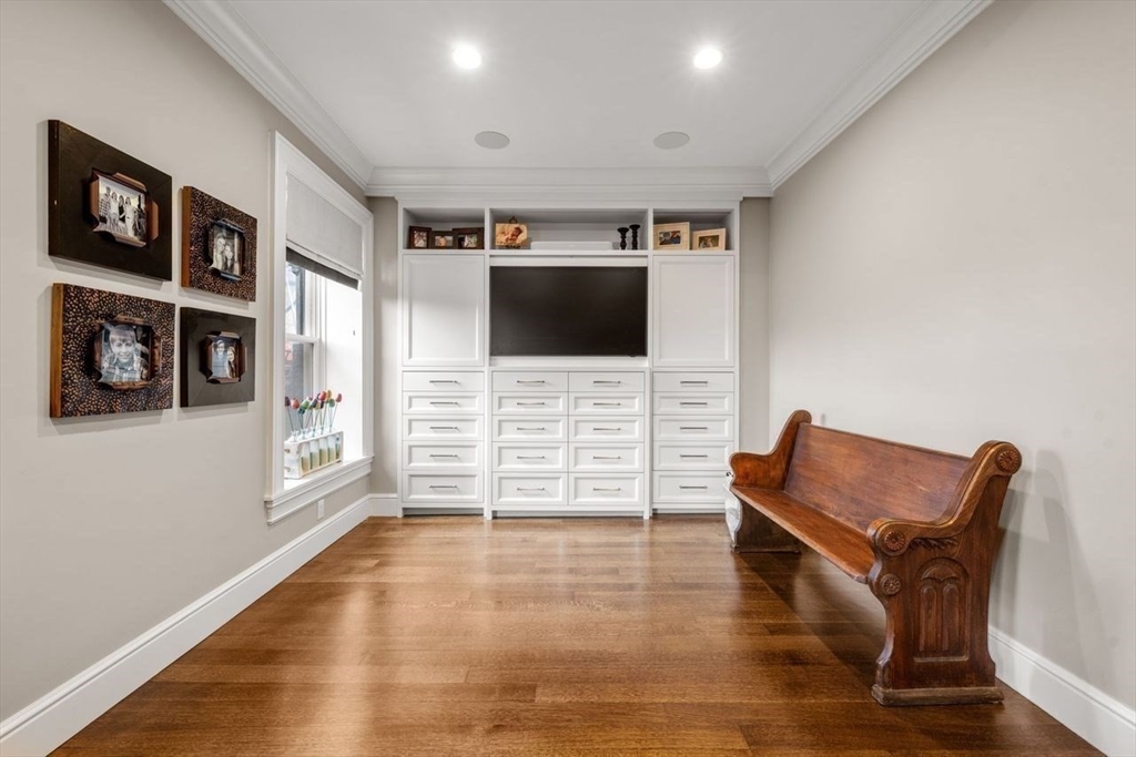 288 Commonwealth Avenue, Unit 3 Boston, MA 02115 - Photo 16 of 25 a living room with furniture and a flat screen tv