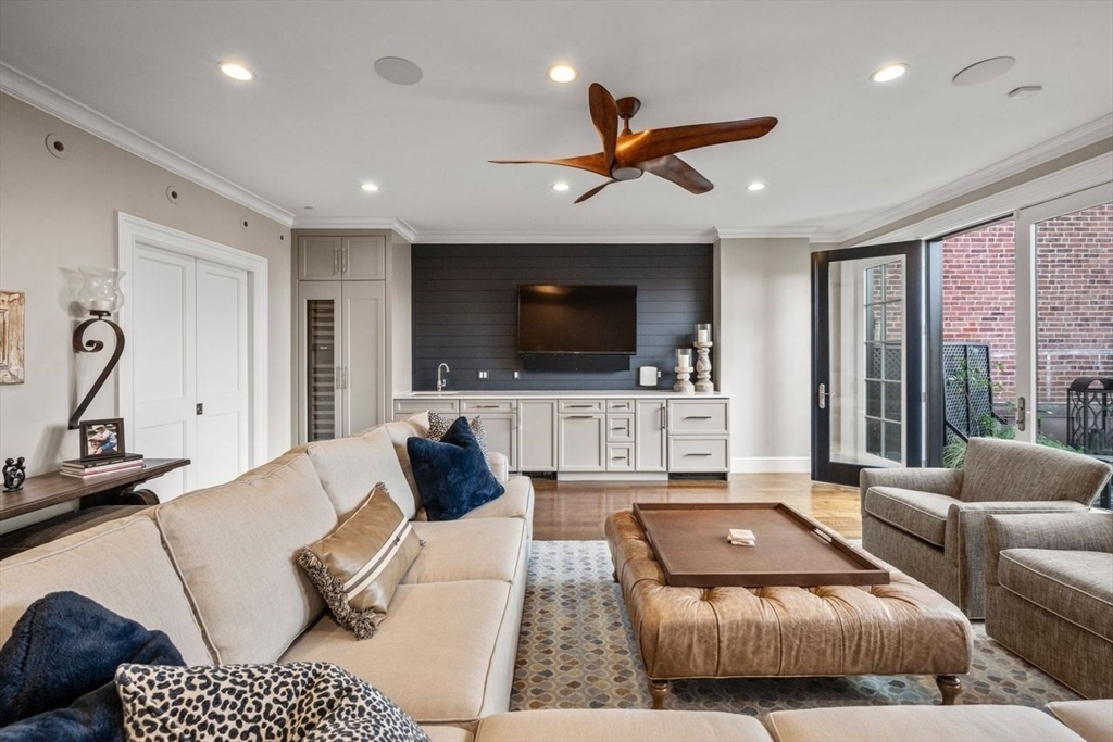 288 Commonwealth Avenue, Unit 3 Boston, MA 02115 - Photo 21 of 25 a living room with furniture and a flat screen tv