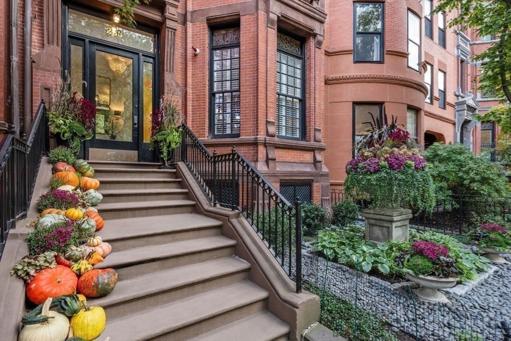 288 Commonwealth Avenue, Unit 3 Boston, MA 02115 - Photo 23 of 25 a front view of a multi story building with yard