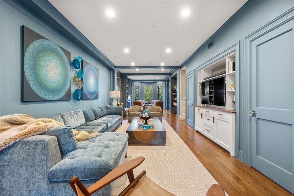 288 Commonwealth Avenue, Unit 3 Boston, MA 02115 - Photo 3 of 25 a living room with furniture and a flat screen tv