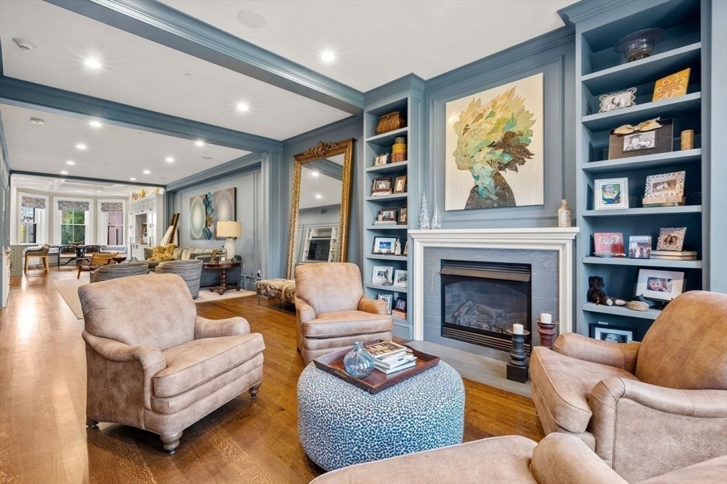 288 Commonwealth Avenue, Unit 3 Boston, MA 02115 - Photo 4 of 25 a living room with furniture fireplace and a bookshelf