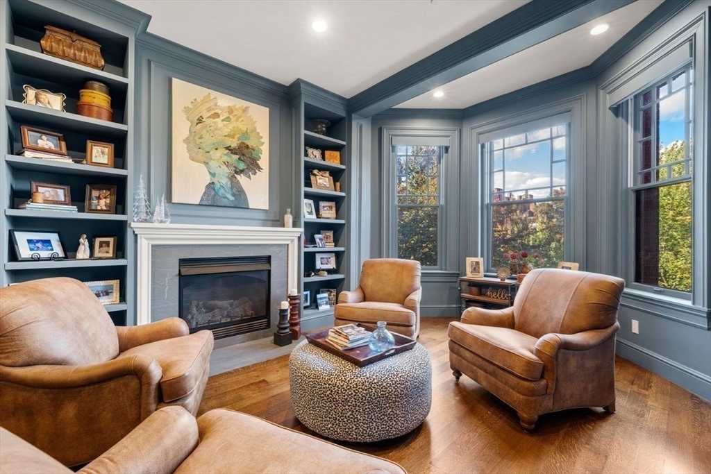 288 Commonwealth Avenue, Unit 3 Boston, MA 02115 - Photo 5 of 25 a living room with furniture and a fireplace