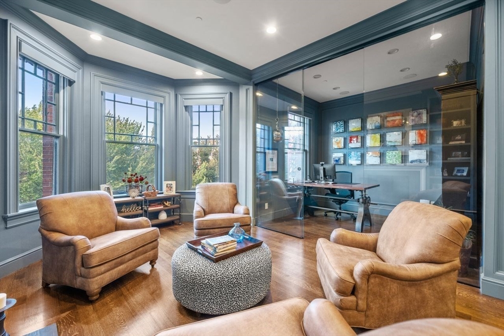 288 Commonwealth Avenue, Unit 3 Boston, MA 02115 - Photo 6 of 25 a living room with furniture and a large window