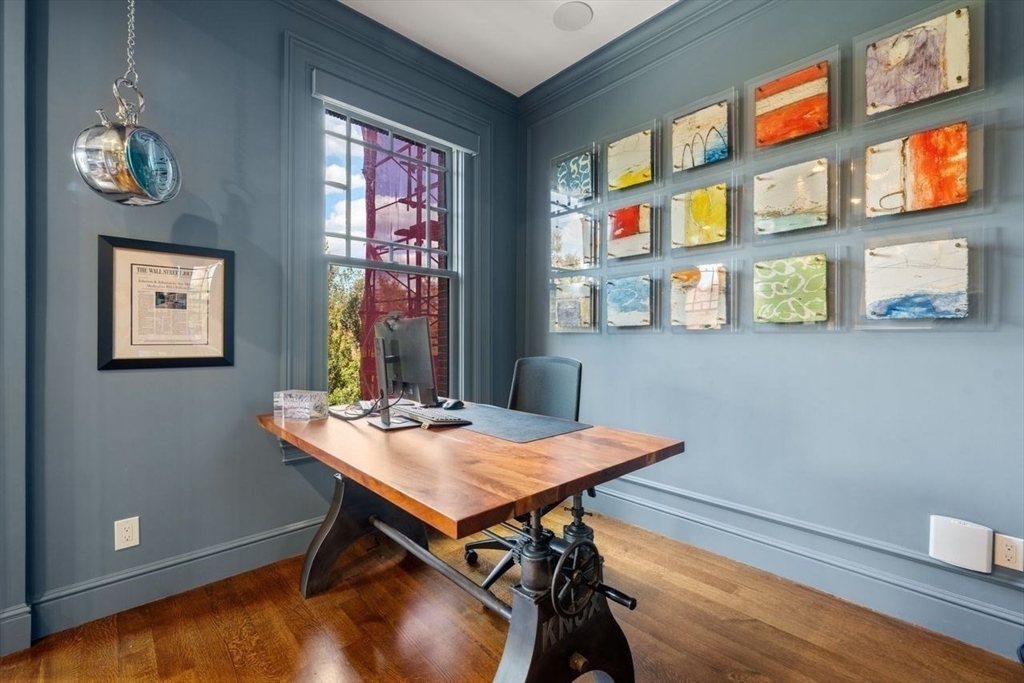 288 Commonwealth Avenue, Unit 3 Boston, MA 02115 - Photo 8 of 25 a view of a workspace with furniture and window in a room