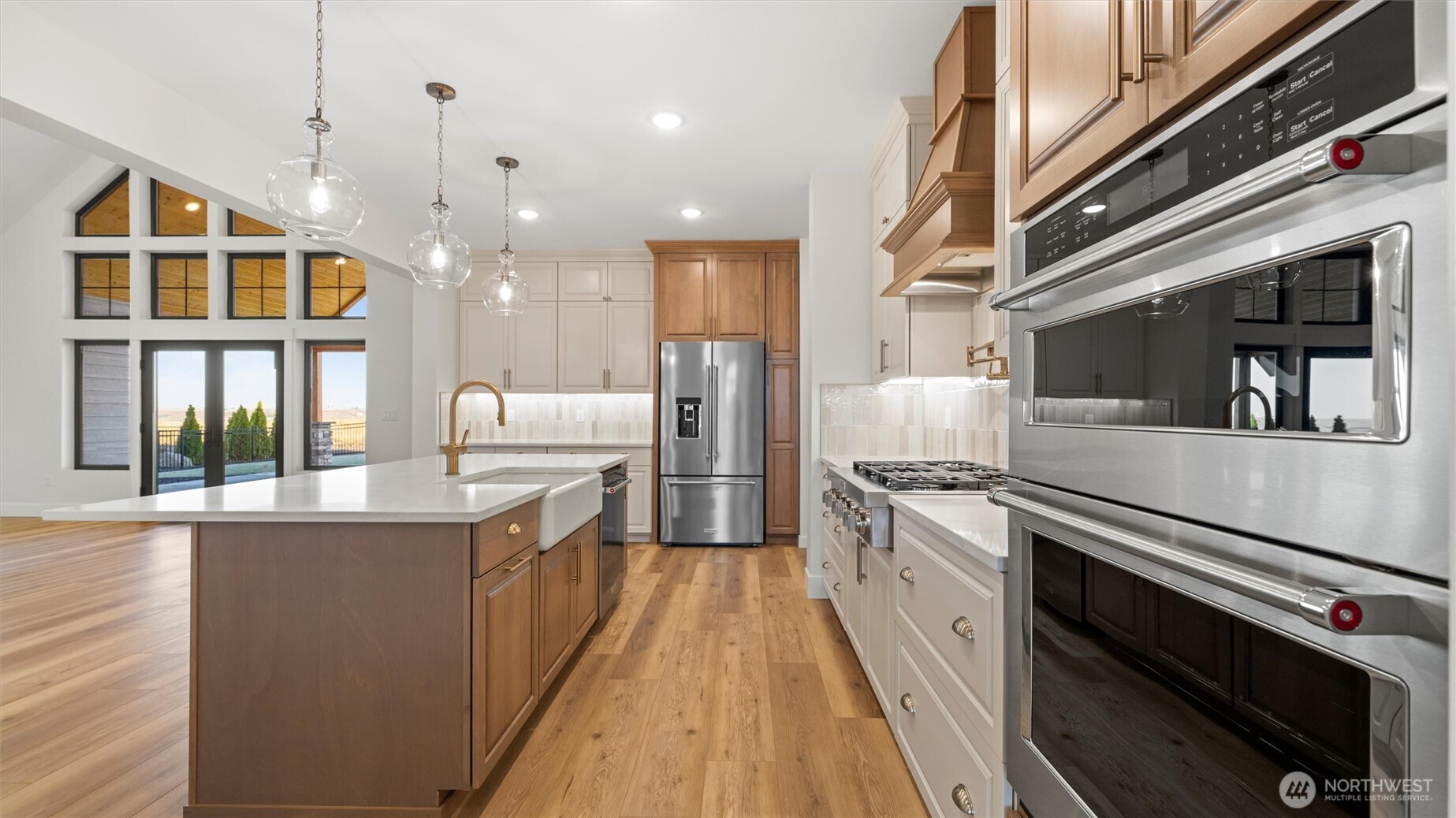 511 Southwest 12th Street College Place, WA 99324 - Photo 11 of 21 a kitchen with stainless steel appliances granite countertop a stove and a sink