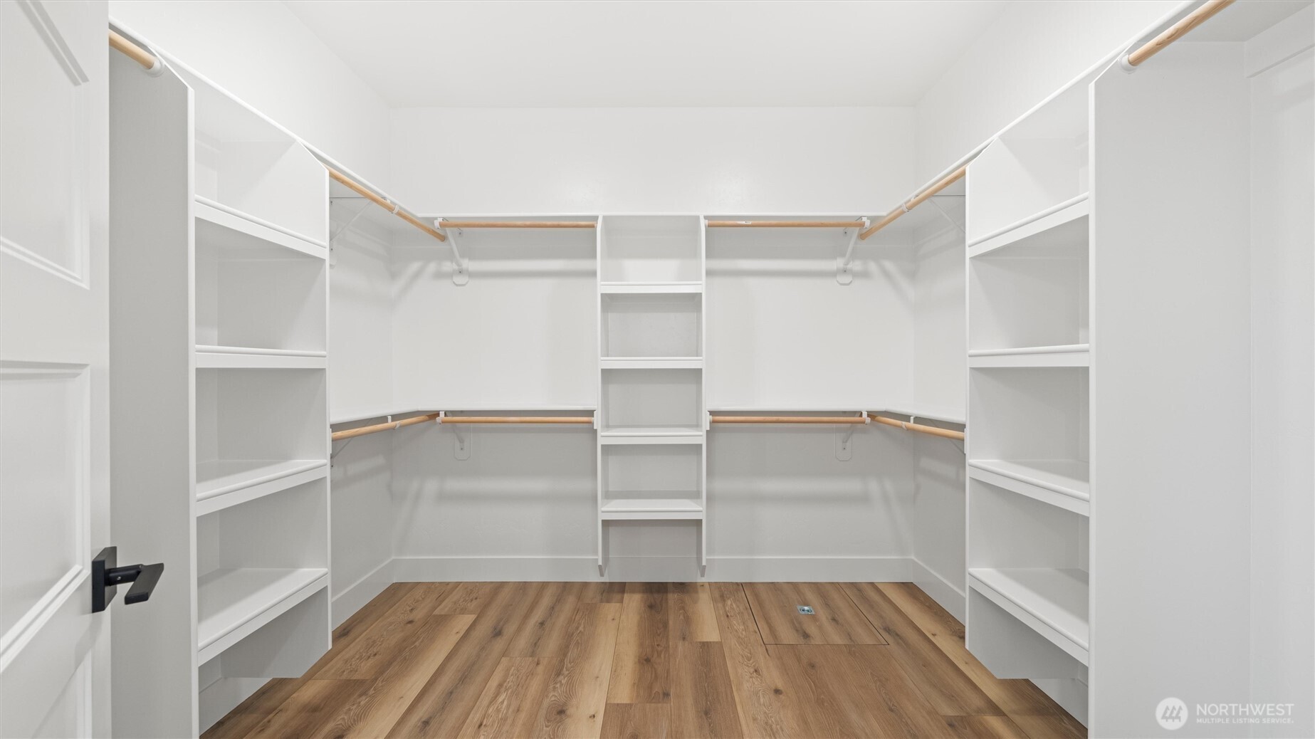 511 Southwest 12th Street College Place, WA 99324 - Photo 13 of 21 a view of walk in closet with empty racks