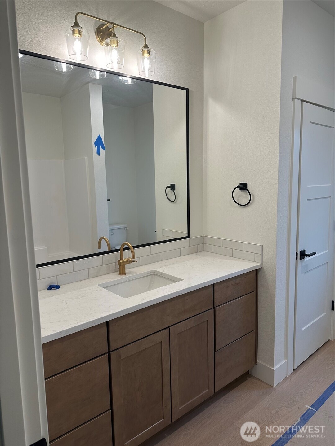 511 Southwest 12th Street College Place, WA 99324 - Photo 19 of 31 a bathroom with a sink and mirror