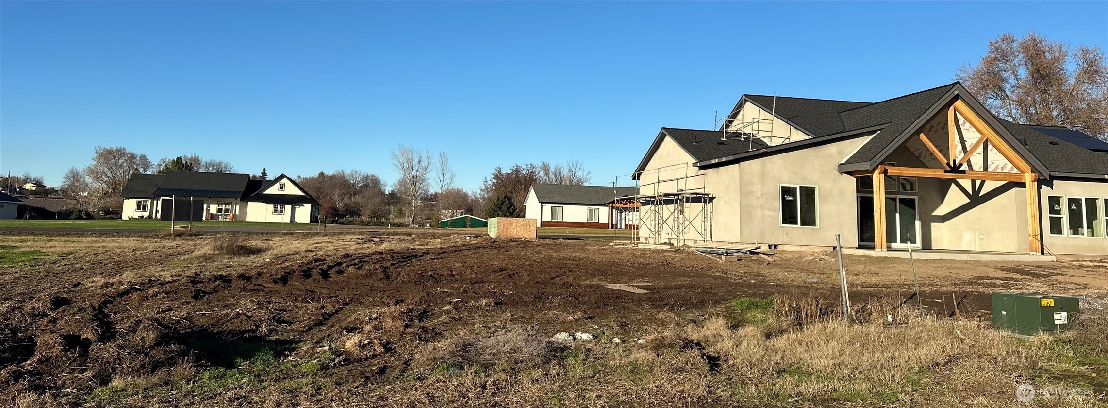 511 Southwest 12th Street College Place, WA 99324 - Photo 19 of 21 a view of a white house next to a road and yard